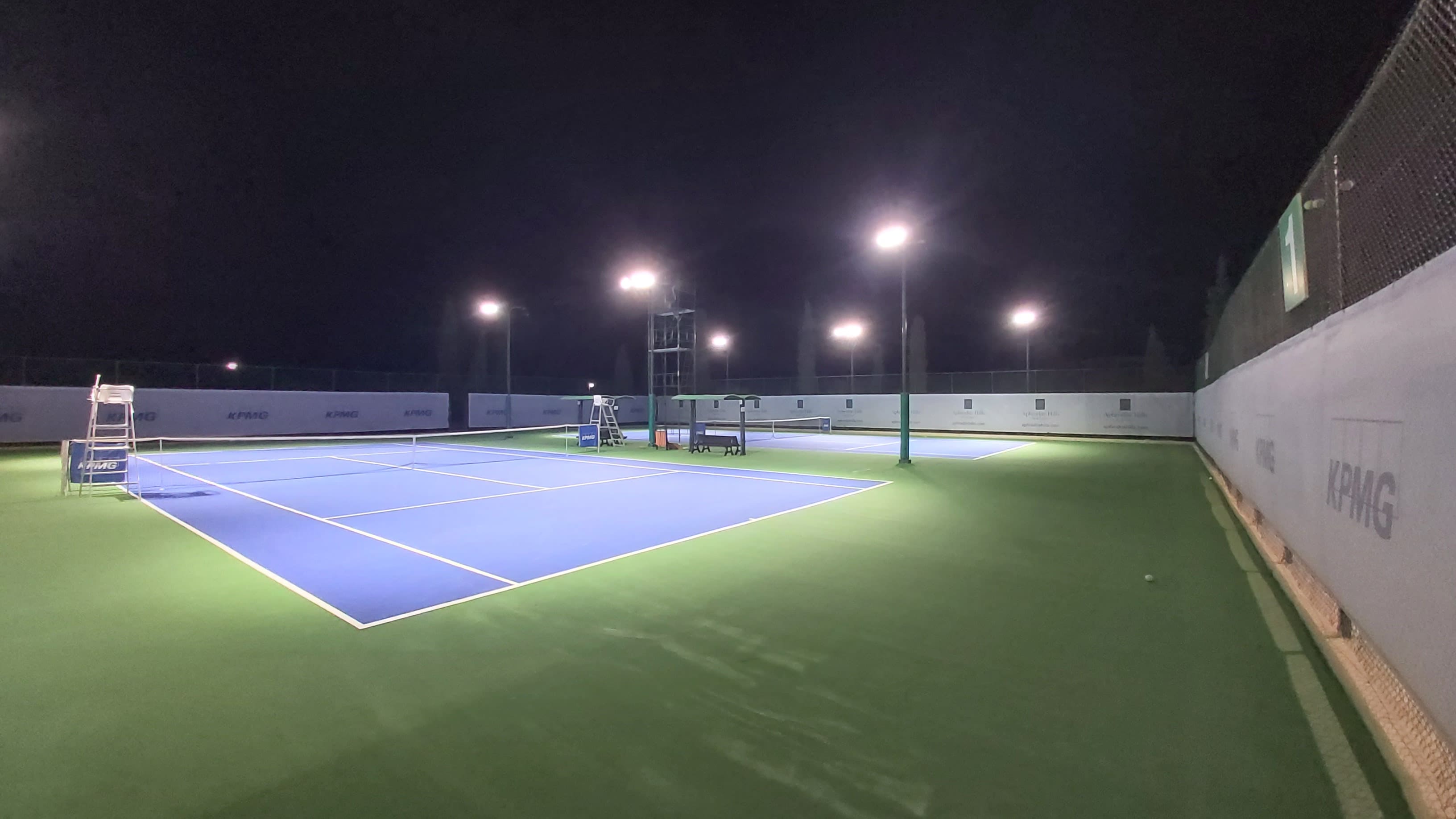 tennis courts in the night